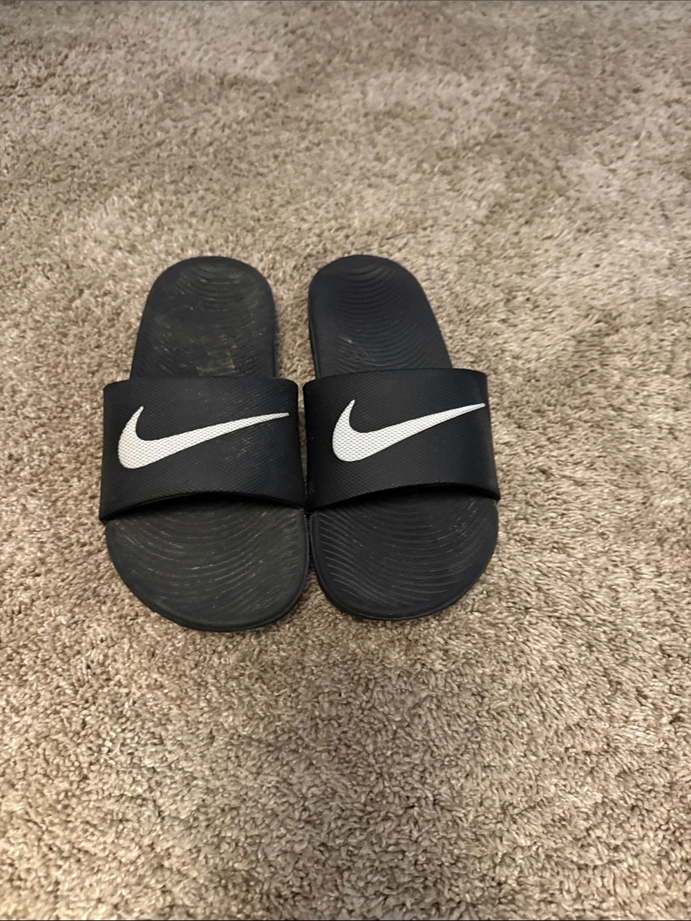 Nike Kids Black Slide Sandals with White Swoosh Logo